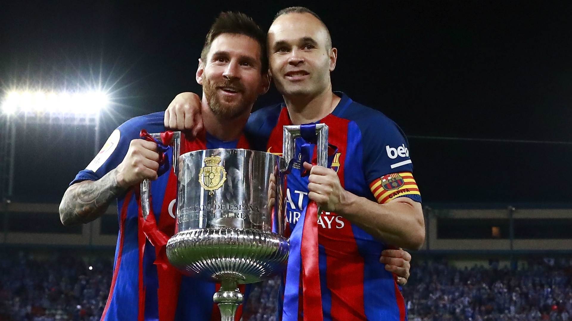 Iniesta and Messi celebrating victory